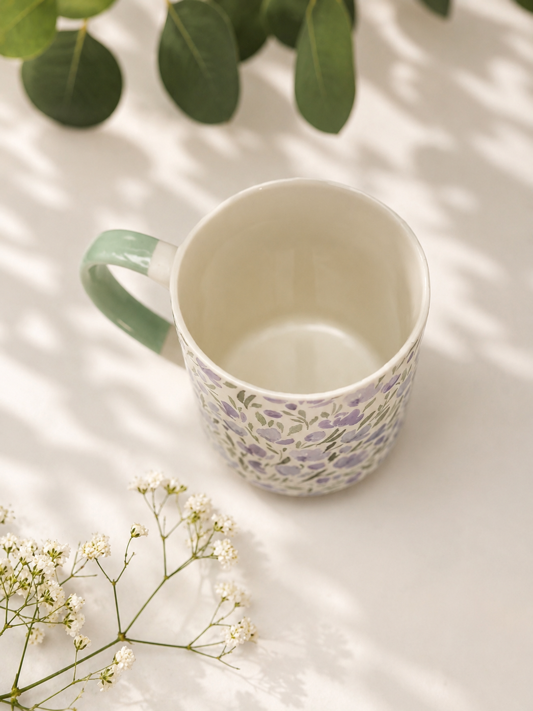 Taza de porcelana flores azul pastel